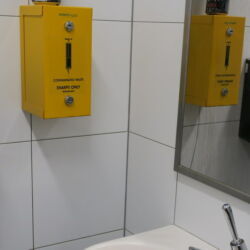 Sharp container in bathroom. OSHA here says the container has to be in red color, not yellow