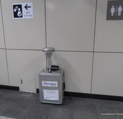 It is some sort of air monitoring machine inside a subway station. If
you can identify it, please let us know.